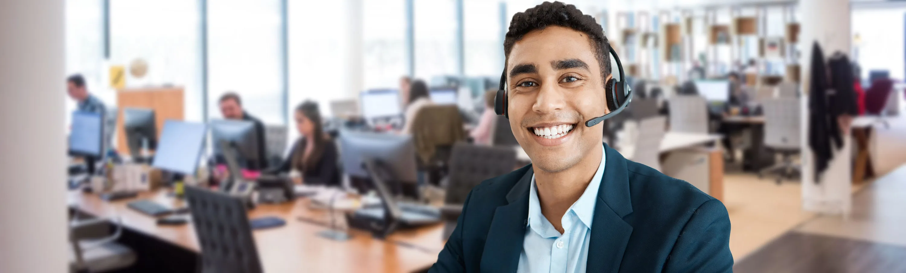 A contact-center floor where the next caller is already waiting.