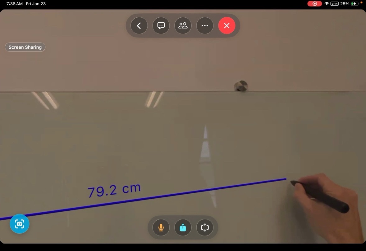 A measurement on Vision Pro with Logitech Muse. A blue line reads 79.2 cm.